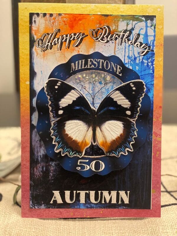 A card with a butterfly on it