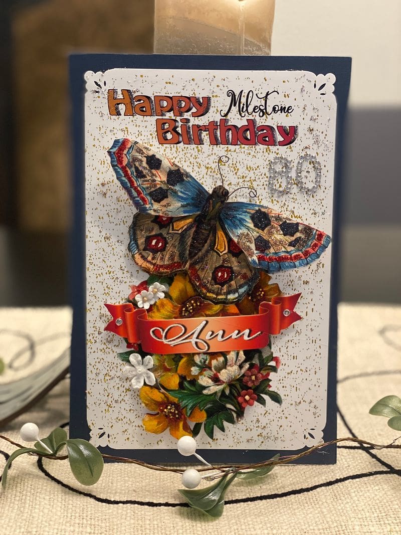 A birthday card with a butterfly on it