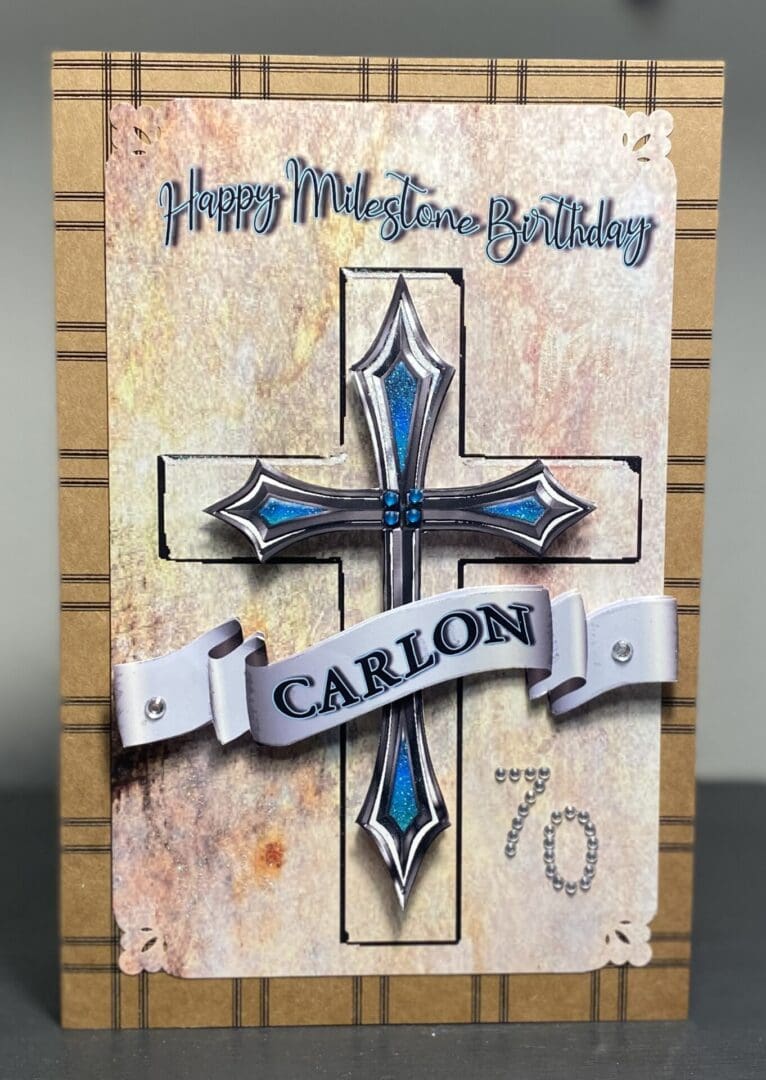 A card with a cross and the words " carlon 7 0 ".